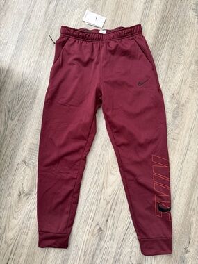 Nike Maroon Men's Joggers with Black Swoosh and Red Accent